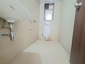 Bathroom in 2 BHK Apartment at Runwal Eirene, Balkum Pada – for Rent