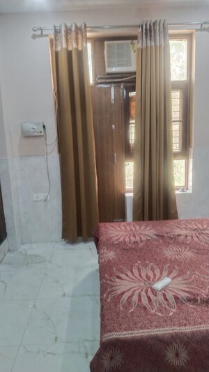 Bedroom in 2 BHK Builder Floor at Gomti Nagar – for Rent