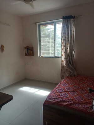 Bedroom in 2 BHK Apartment at Siddhidata Iyana Residency, Wakad – for Rent