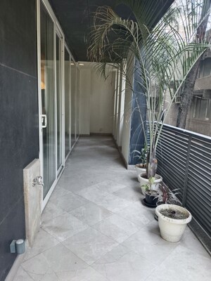 Balcony in 4 BHK Apartment at Vasant Vihar – for Rent