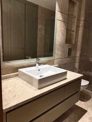 Bathroom in 4 BHK Apartment at Vasant Vihar – for Rent