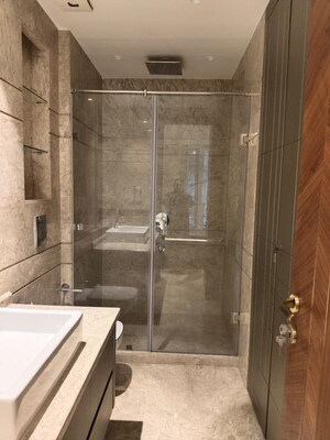 Bathroom in 4 BHK Apartment at Vasant Vihar – for Rent