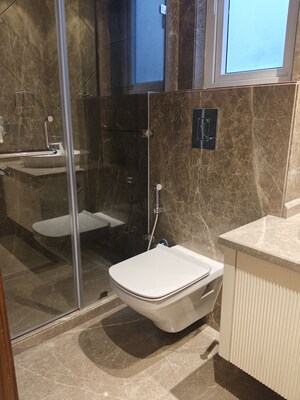 Bathroom in 4 BHK Apartment at Vasant Vihar – for Rent
