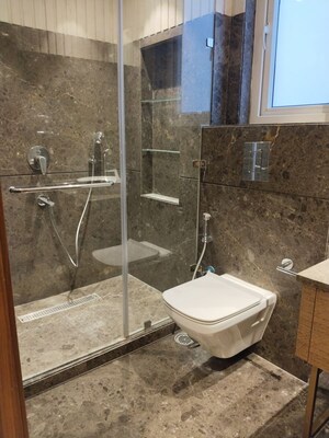Bathroom in 4 BHK Apartment at Vasant Vihar – for Rent