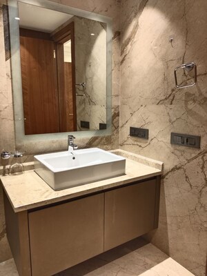 Bathroom in 4 BHK Apartment at Vasant Vihar – for Rent