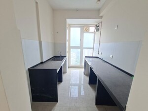 Kitchen in 1 BHK Apartment at Tata Serein, Pokhran Road No Two – for Sale