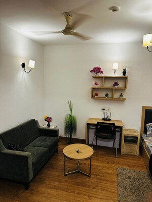 Team Area in 1 RK Apartment at Nimbus The Golden Palm, Sector 168 – for Sale