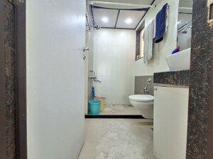 Bathroom in 2 BHK Apartment at Rustomjee Urbania Acura, Thane West – for Sale
