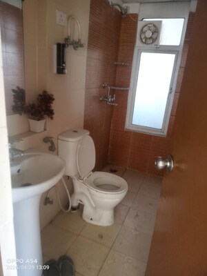Bathroom in 2.5 BHK Apartment at Mahagun My Woods, Sector 16c Greater Noida – for Rent