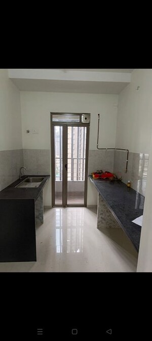 Kitchen in 2 BHK Apartment at Kalpataru Paramount, Kapur Bawdi – for Sale