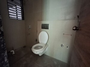 Bathroom in 2 BHK Apartment at Je And Vee Om Trimurti, Malad East – for Sale