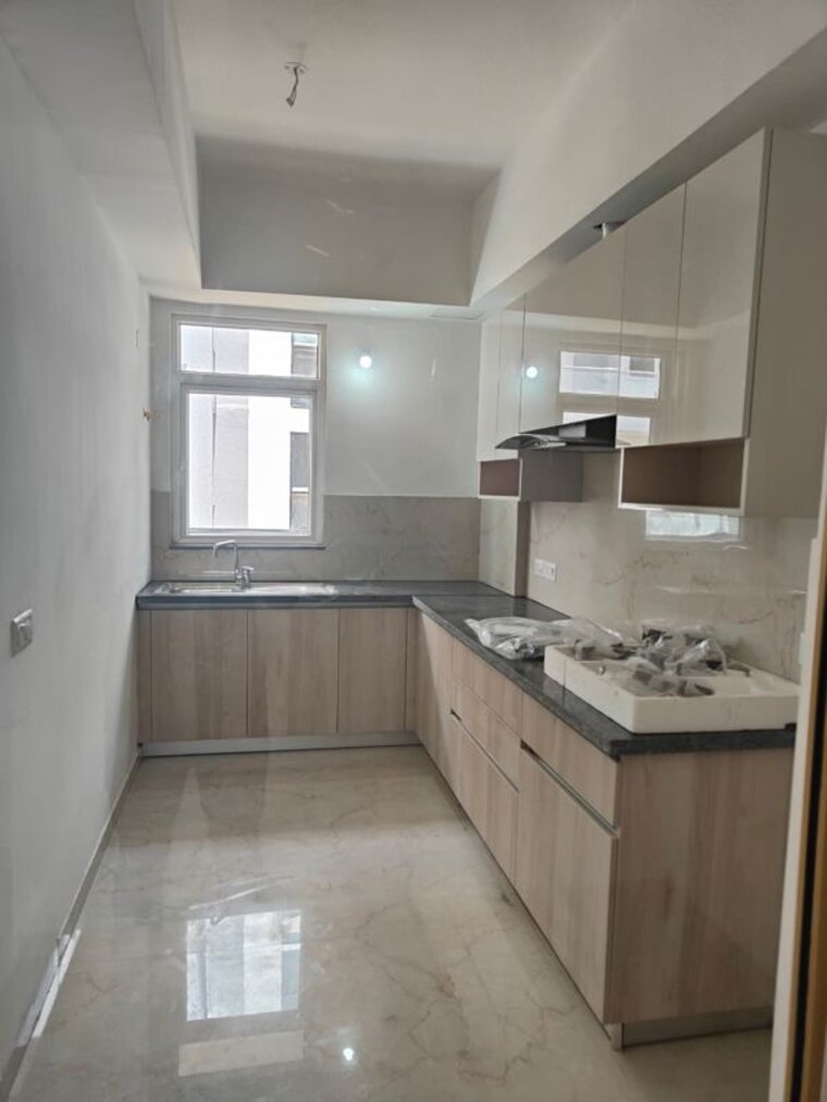 Kitchen, smart-world-orchard 2 Bedroom 1350 Sq.Ft. Apartment In Sector 61 Gurgaon 10335099