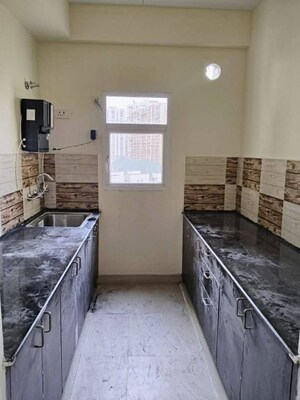 Kitchen in 2 BHK Apartment at BSB Vaibhav Heritage Height, Sector 16 Greater Noida – for Rent