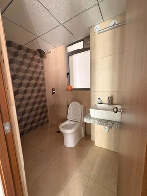 Bathroom in 3 BHK Apartment at Kalpataru Immensa B, Kolshet Road – for Rent
