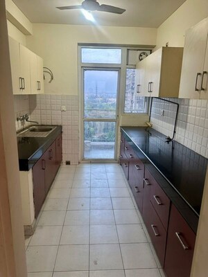 Kitchen in 3.5 BHK Apartment at Emaar MGF The Palm Drive Studios, Sector 66 – for Rent