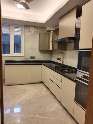 Kitchen in 4 BHK Apartment at Panchsheel Park – for Sale