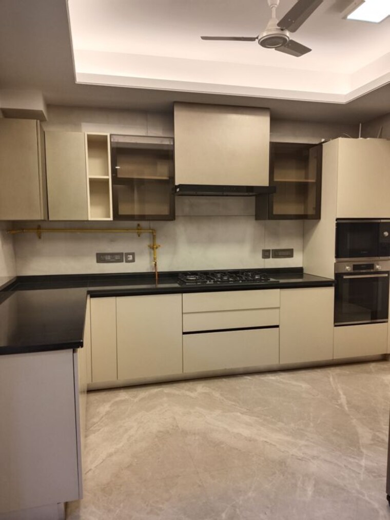 Kitchen, panchsheel park 4 Bedroom 4500 Sq.Ft. Apartment In Panchsheel Park Delhi 10338721