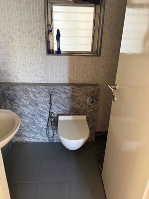 Bathroom in 3 BHK Apartment at Kalpataru Hills Phase II, Manpada – for Rent