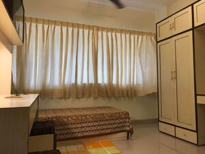 Bedroom in 2 BHK Apartment at Lokhandwala Complex – for Sale