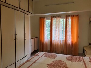 Bedroom in 2 BHK Apartment at Lokhandwala Complex – for Sale