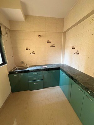 Kitchen in 1 BHK Apartment at Puranik City Reserva, Ghodbunder Road – for Rent