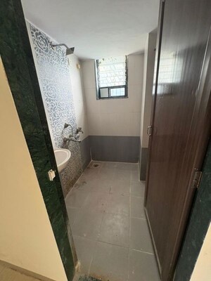 Bathroom in 1 BHK Apartment at Puranik City Reserva, Ghodbunder Road – for Rent