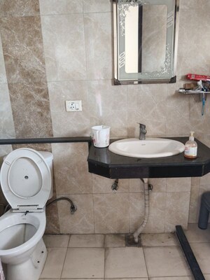 Bathroom in 2 BHK Apartment at Land Craft Golf Links Apartment Phase 2, Pandav Nagar – for Sale
