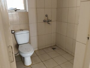 Bathroom in 2.5 BHK Apartment at Landcraft Golf Links, Pandav Nagar – for Rent