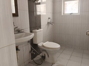 Bathroom in 2.5 BHK Apartment at Landcraft Golf Links, Pandav Nagar – for Rent
