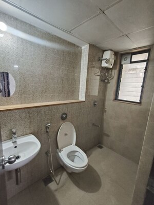 Bathroom in 1.5 BHK Apartment at Lodha Lakeshore Greens, Dombivli East – for Rent