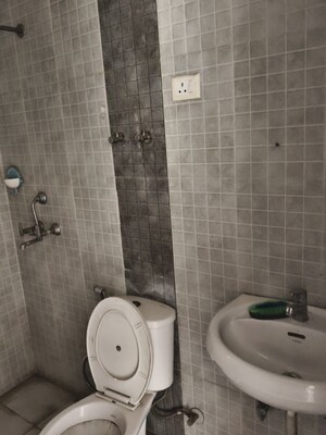 Bathroom in 2 BHK Apartment at Land Craft Golf Links Apartment Phase 2, Pandav Nagar – for Rent