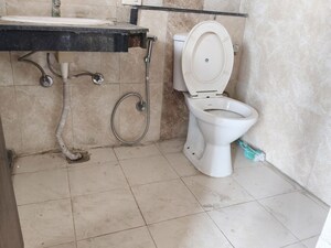 Bathroom in 2 BHK Apartment at Land Craft Golf Links Apartment Phase 2, Pandav Nagar – for Rent
