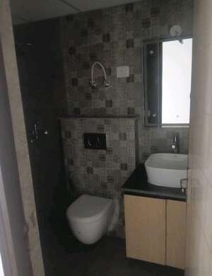 Bathroom in 2 BHK Apartment at Nimbus The Express Park View II, Chi V Greater Noida – for Rent