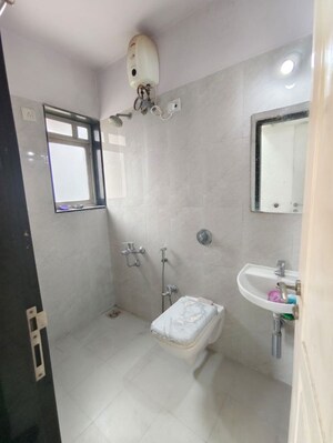 Bathroom in 1 BHK Apartment at Puranik City, Kasarvadavali – for Rent
