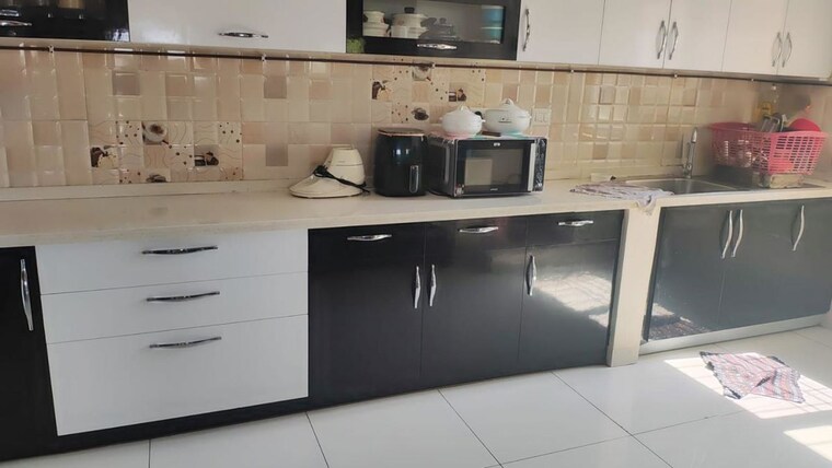 Kitchen, salarpuria-sattva-cadenza 3 Bedroom 1850 Sq.Ft. Apartment In Kudlu Gate Bangalore 10339015