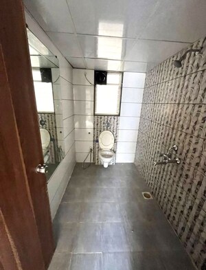 Bathroom in 2 BHK Apartment at Aaugusta, Kharadi – for Rent