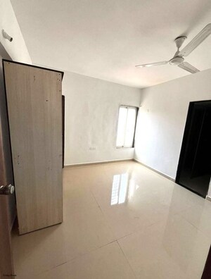 Living Room in 2 BHK Apartment at Aaugusta, Kharadi – for Rent