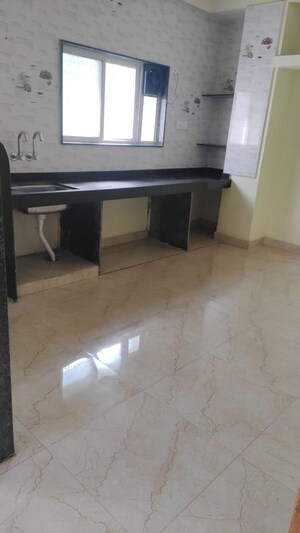 Kitchen in 2 BHK Apartment at Aaugusta, Kharadi – for Rent