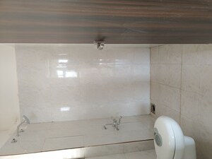 Bathroom in 3 BHK Apartment at Vasudha Sai Eshanya, Balewadi – for Rent