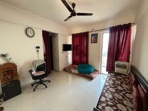 Living Room in 1 BHK Apartment at Pharande Kairosa, Punawale – for Rent
