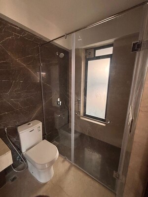 Bathroom in 2 BHK Apartment at Kalpataru Mugnus, Bandra East – for Rent