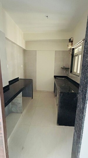 Kitchen in 1 BHK Apartment at Sheth Irene, Malad West – for Sale