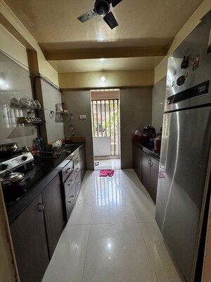 Kitchen in 2 BHK Apartment at Dheeraj Pooja, Malad West – for Rent