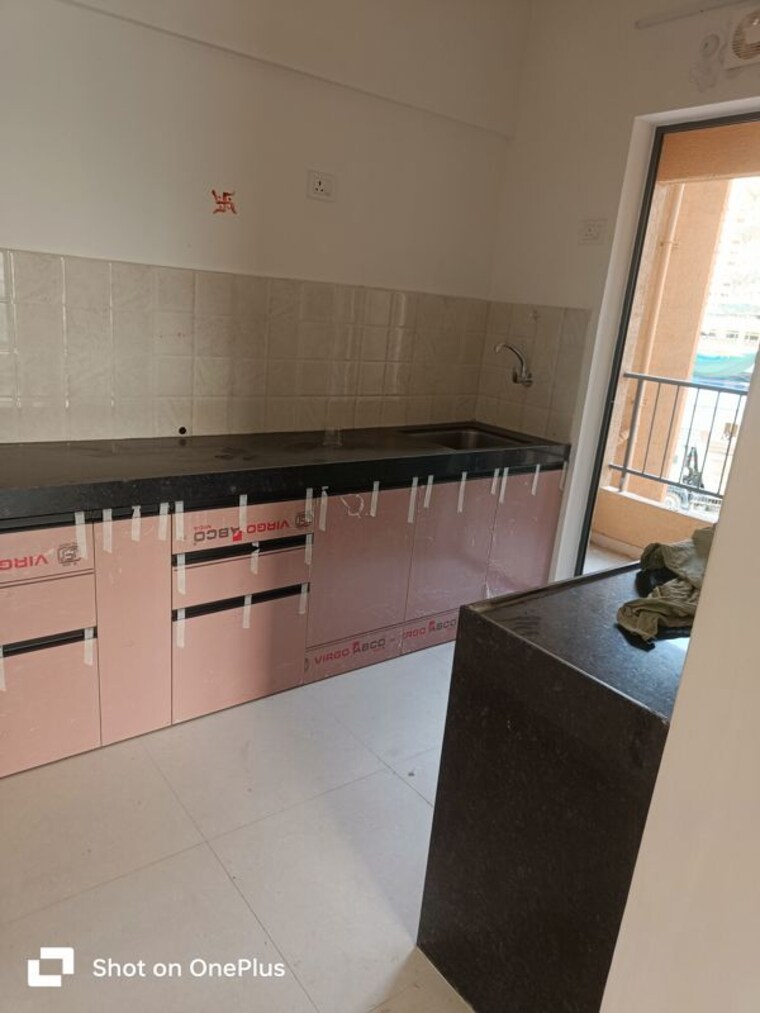 Kitchen, shapoorji-pallonji-joyville-hadapsar-annexe 2 Bedroom 650 Sq.Ft. Apartment In Hadapsar Pune 10339131