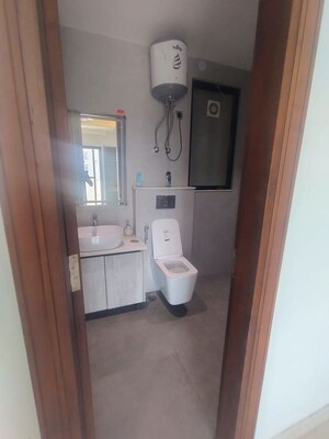 Bathroom in 4 BHK Builder Floor at Ansal API Versalia, Sector 67a – for Rent