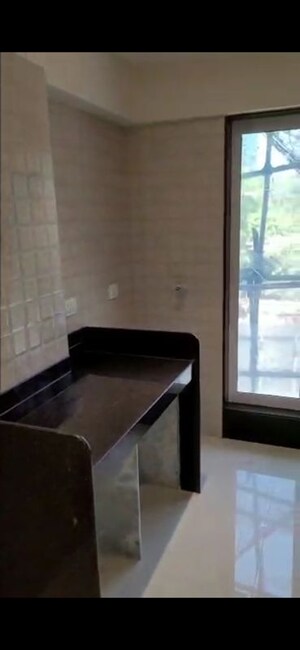Kitchen in 3 BHK Apartment at Triumph Tower, Malad West – for Sale