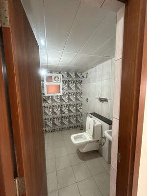Bathroom in 3 BHK Apartment at Bhartiya City Nikoo Homes II, Thanisandra Main Road – for Rent
