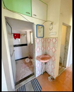 Bathroom in 1 BHK Apartment at Puraniks Kanchanpushp Complex, Kavesar – for Rent