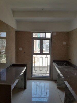 Kitchen in 2 BHK Apartment at Apex Green Wood, Borivali East – for Sale