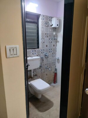 Bathroom in 1 BHK Apartment at Raunak Delight, Owale – for Rent